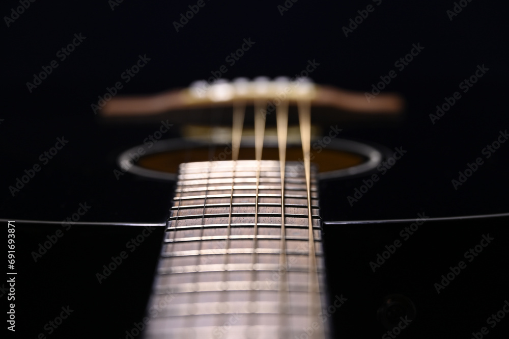 six string acoustic guitar made of wood