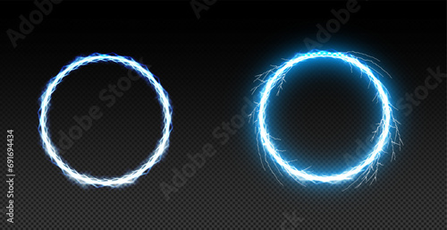 This is a captivating vector illustration showcasing two radiant blue circles, composed of minuscule particles, set against a deep black background, exuding a futuristic, sci-fi aura. photo