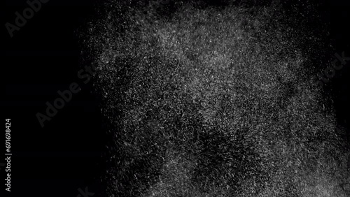 Huge falling VFX dust particles Floating On Black Background. Dynamic Dust Particles Randomly Float In Space. Shimmering Glittering Dust Particles