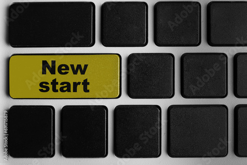 Button with text NEW START ...