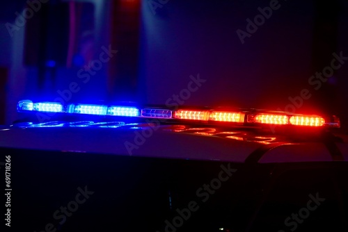 Police car with overhead flashing lights for emergency  photo