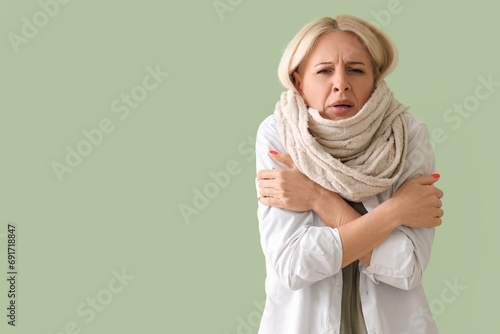Ill mature woman with fever...