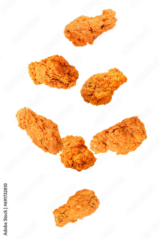 Falling fried chicken isolated on white background. Falling fried chicken isolated on white background.
