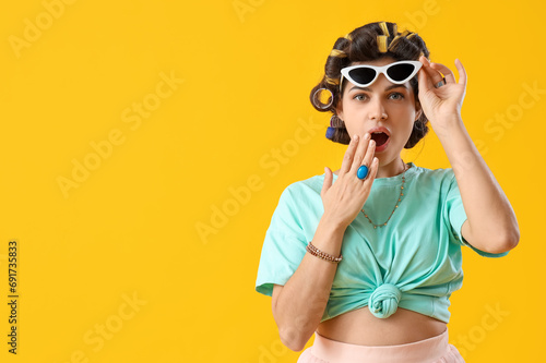 Shocked young woman with ha...