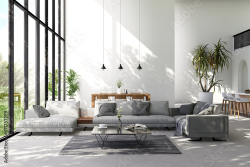 Modern loft style living and dining room with garden view 3d render There are whte paint wall and concrete floor overlooking nature view background sunlight shining into the room. photo