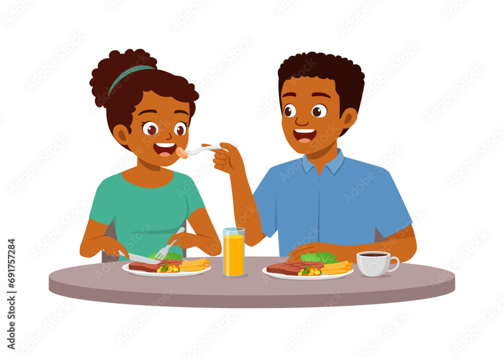 young couple man and woman eat meat steak together young couple man and woman eat meat steak together