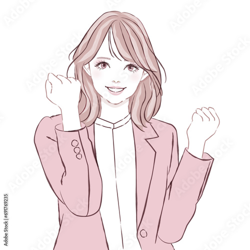 笑顔でガッツポーズする女性