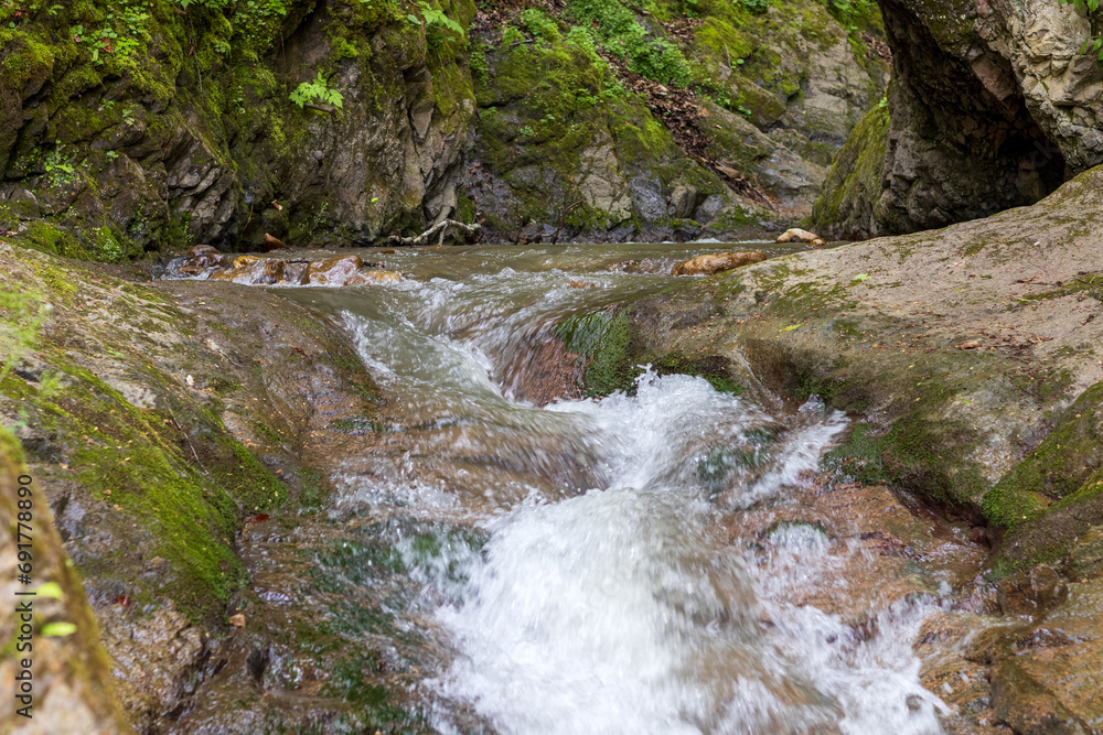 Mountain river spring season with sand and stone shoals along the banks. Mountain river spring season with sand and stone shoals along the banks.
