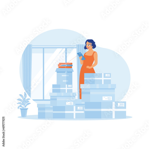 Women entrepreneurs start business ventures at home. SME entrepreneurs take photos of products using mobile phones before sending them to customers. order Confirmation concept. 