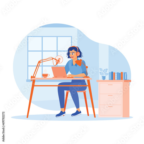 A female content creator hosts a podcast in the studio. Streaming podcast host with a condenser microphone working in the small broadcast studio. Content Creator concept. 