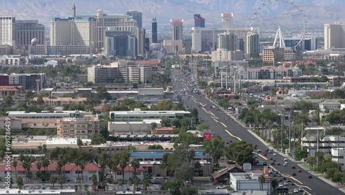 Las Vegas strip, Nevada tilt up zoomed in aerial reveal in daytime photo