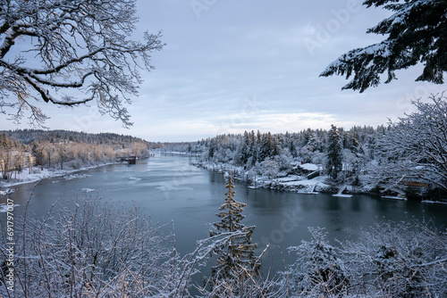 Willamette River viewed from the southern suburbs in the Portland metro area in Oregon on a cold winter morning after overnight snowfall. photo