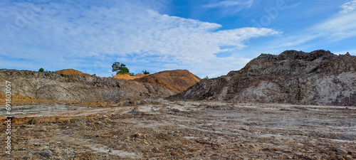 arid land left over from illegal coal mining excavations in Kalimantan, Indonesia 