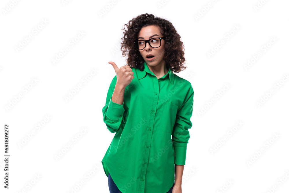portrait of a brunette young caucasian lady with curly hair dressed in a green shirt portrait of a brunette young caucasian lady with curly hair dressed in a green shirt