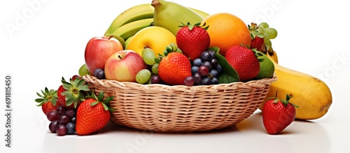 Fresh organic fruits in a rattan basket.