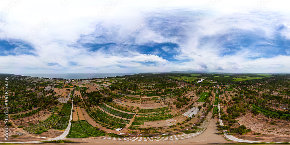 Full seamless spherical hdri panorama 360 degrees angle aerial view of Agricultural land such as rice fields, vegetable gardens and coconut plantations in coastal areas in Kulon Progo, Yogyakarta.