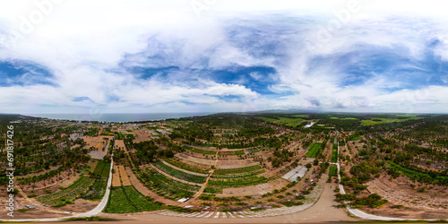 Full seamless spherical hdri panorama 360 degrees angle aerial view of Agricultural land such as rice fields  vegetable gardens and coconut plantations in coastal areas in Kulon Progo  Yogyakarta.