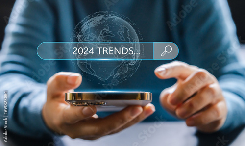 Human searching keyword of 2024 trends planning in new year, business trends, fashion trends, start up, marketing, planning, technology update, year 2024, SEO, digital marketing online