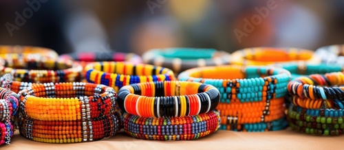 Street market in South Africa selling handmade African fashion accessories such as colorful bead bracelets and bangles, showcasing traditional craftsmanship. photo