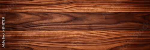 wood texture. background old panels. Walnut tree texture close up. Wide walnut wood texture background. Walnut veneer is used in luxury finishes. photo