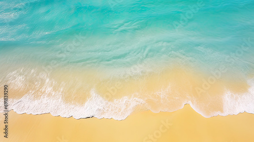 surface Waves on the beach as a background Blue sea surface, top view 