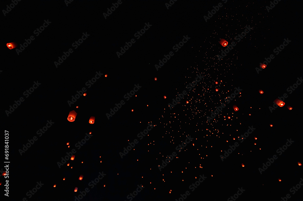 The beauty of the lanterns floating in the sky during the Yi Peng Festival and the Floating Lantern Festival in Chiang Mai Province, Thailand. The beauty of the lanterns floating in the sky during the Yi Peng Festival and the Floating Lantern Festival in Chiang Mai Province, Thailand.