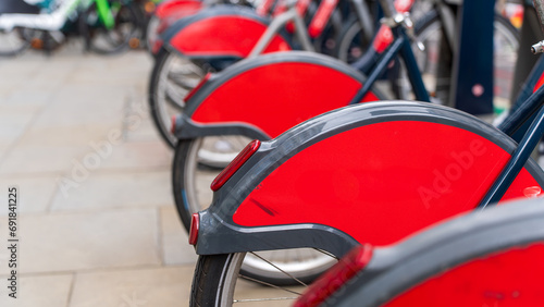 Row of red bikes in London