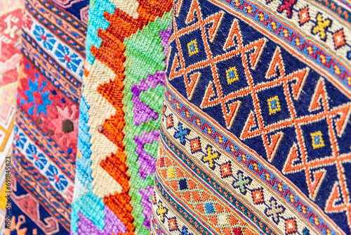 Fragment of traditional Turkish multicolor carpet. Travelling and shoping, traditional sovenir. Istanbul, Turkey photo