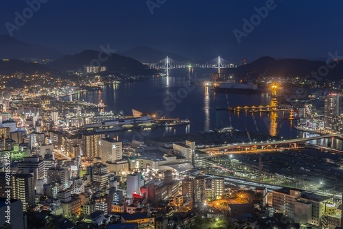 Night cityscape in Nagasaki - view from near the mouth of Urakami River