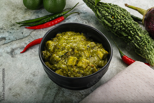 Indian cuisine - palak paneer cheese with spinach photo