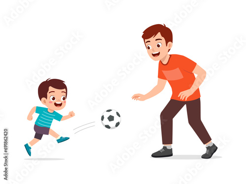 little kid with father play foot ball