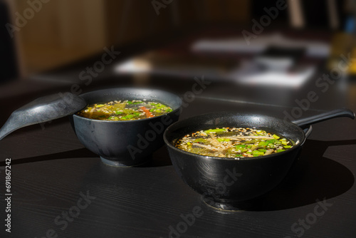 Fish Broth with Greens, Sesame Seeds and Herbs