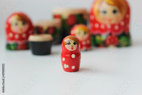 Little matryoshka on a white background