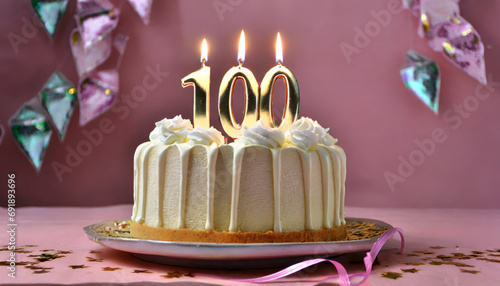 Centennial sweetness: white cake with "100" candles on pink