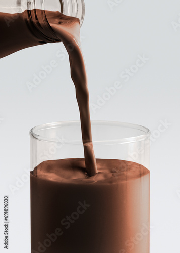 Chocolate milk poured into a glass
