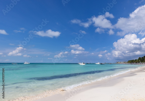 Fototapeta Naklejka Na Ścianę i Meble -  Mexico, Cancun, Isla Mujeres, Playa Norte beach with palms trees and sand waiting for tourists