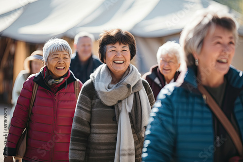 Happy senior women enjoying outdoor recreation. Smiles, laughter and togetherness define their positive lifestyle.