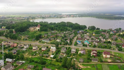 Wallpaper Mural Aerial view of rural countryside with clean wooden houses pasture and blue sky. Clean rural countryside with drone Torontodigital.ca