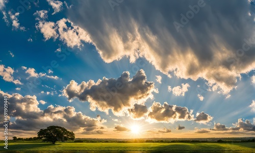 Vibrant sunset landscape with moody cloudscape
