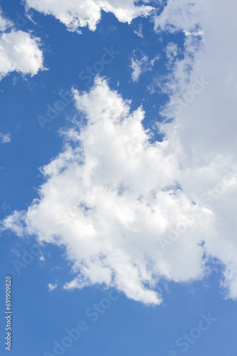 Blue sky with clouds. Wallpaper concept.