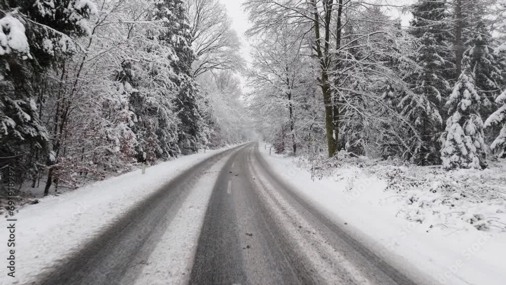 Aerial view of a snowy road in northern germany Aerial view of a snowy road in northern germany