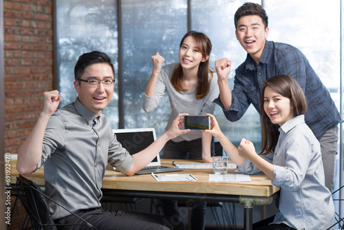 IT workers developing smart phone