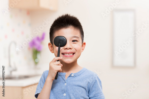 Boy with eye cover plate photo