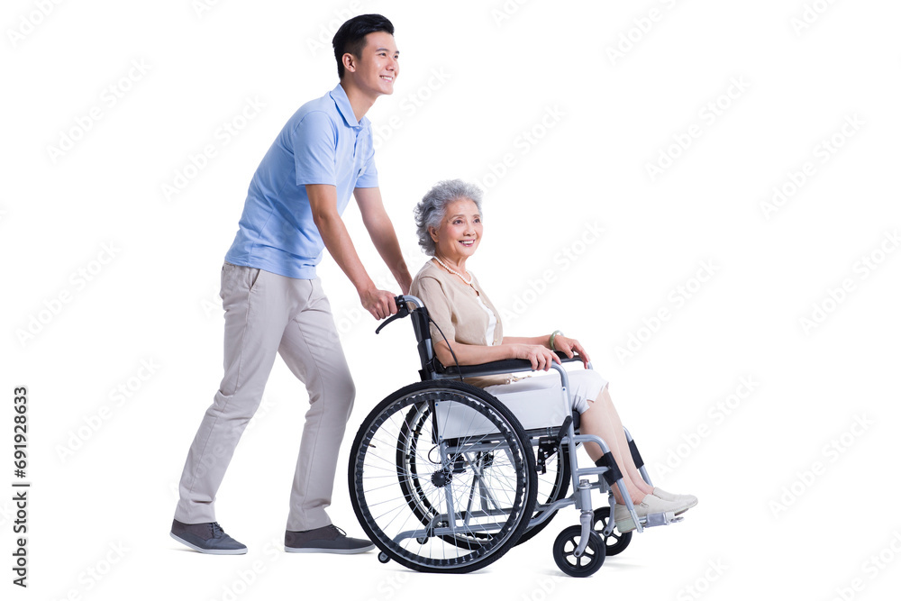 Male nursing assistant taking care of senior in wheelchair Male nursing assistant taking care of senior in wheelchair