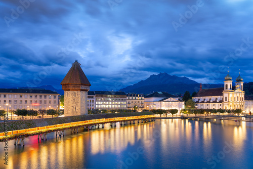 Lucerne, Switzerland with the Chapel Bridge over the River Reuss with Mt. Pilatus