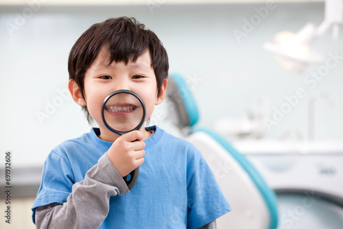 Cute little boy in dental clinic