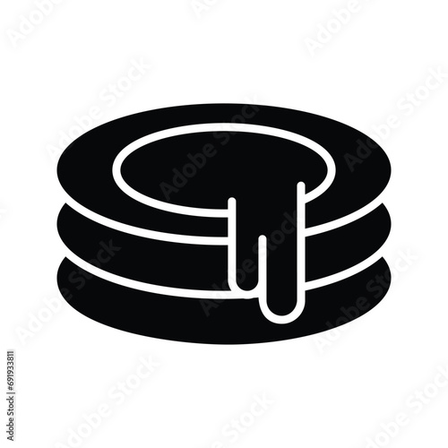 Pancake with caramel cream topping, freshly made pancake stack with butter and syrup