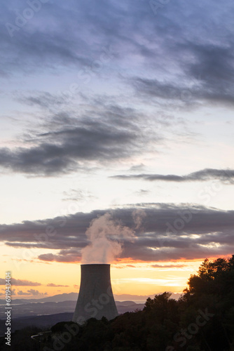 Sunset on the cooling chimney of the boraciferous blowers