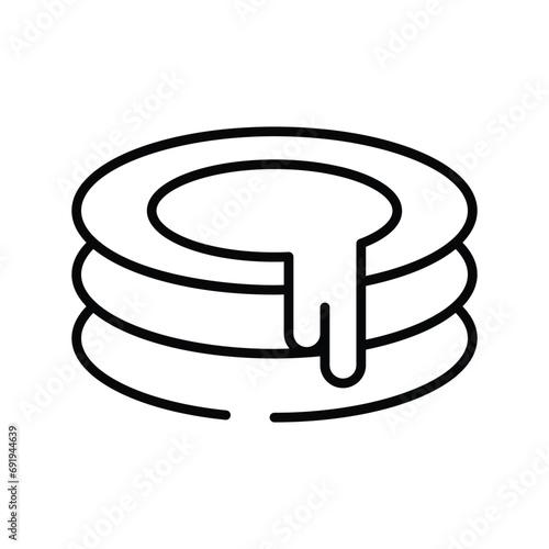 Pancake with caramel cream topping, freshly made pancake stack with butter and syrup