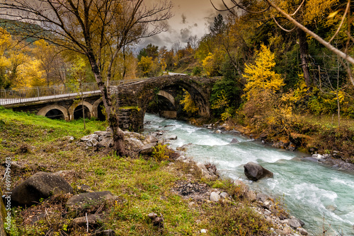 Old and new bridges over Sorrosal stream in Broto. Huesca. Aragon. Spain. Europe.